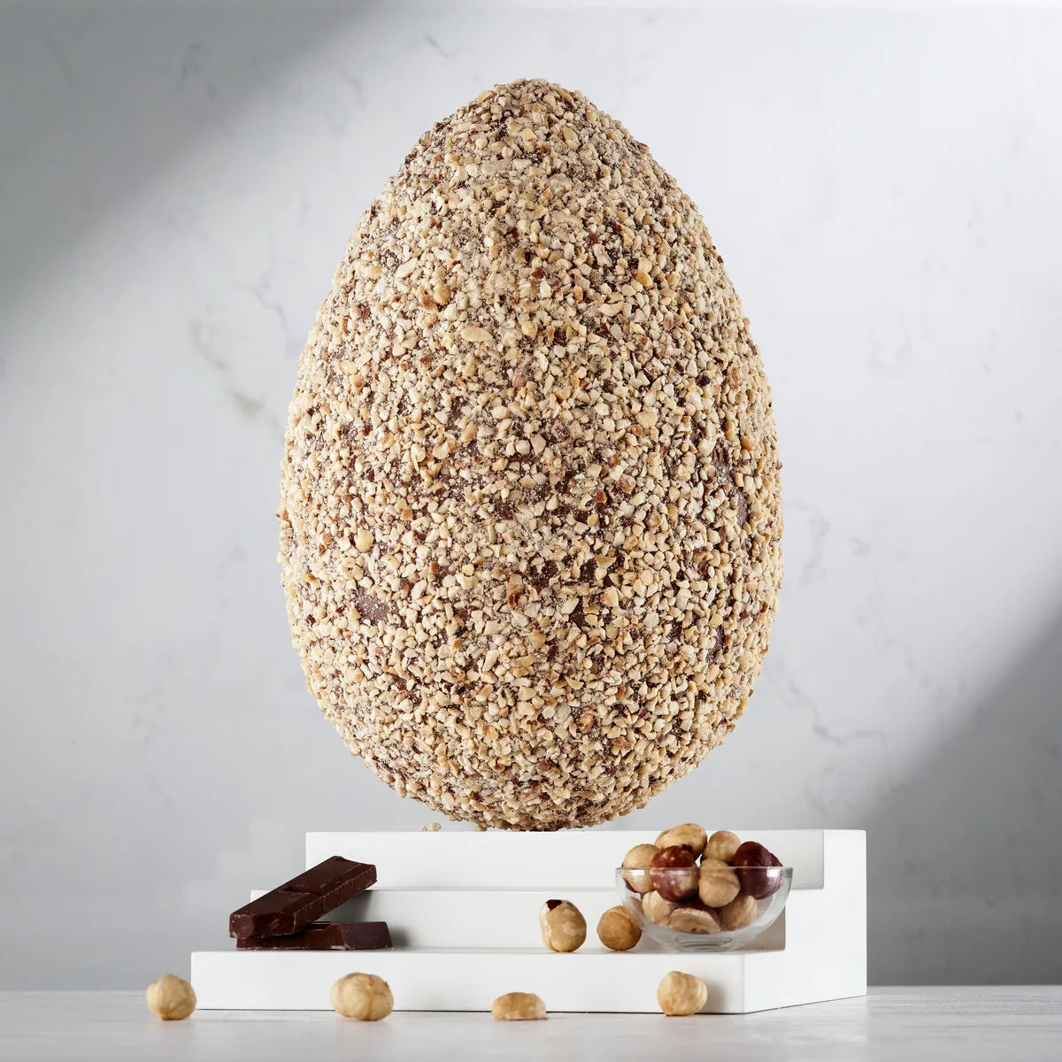 Uovo Artigianale Cioccolato al Latte Granellato Nocciola